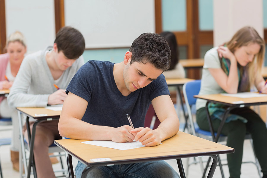 Students taking a test in a classroom in Deer Park